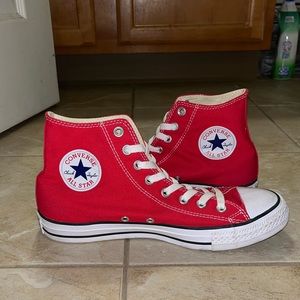 Red high top converse sneakers